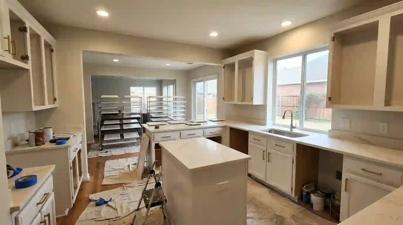 Kitchen cabinets freshly painted soft white